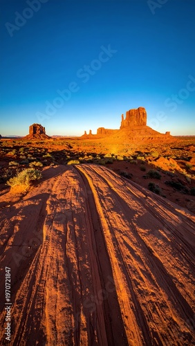 Vibrant Sunset Over Monument Valleys Iconic Buttes and Desert Landscape.