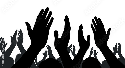 Silhouette of many diverse hands raised in the air celebrating success or voting