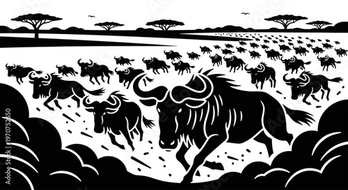 Herd of wildebeest running across the savanna landscape.