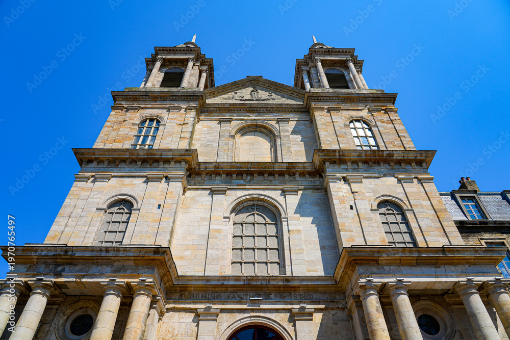 Fototapeta premium The neoclassical west facade and towers of the Basilica of Notre-Dame in Boulogne-sur-Mer, Pas-de-Calais, Northern France