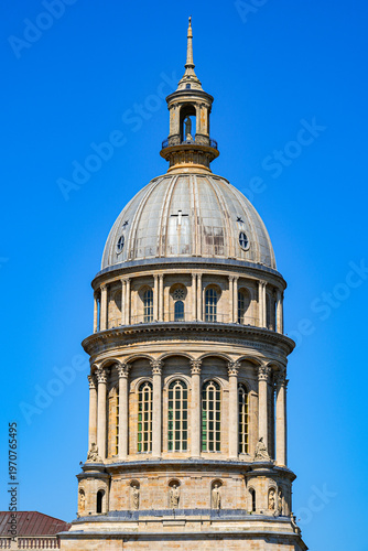 The neoclassical dome of the Basilica of Notre-Dame under a clear blue sky in the old town of Boulogne-sur-Mer, Pas-de-Calais, Northern France