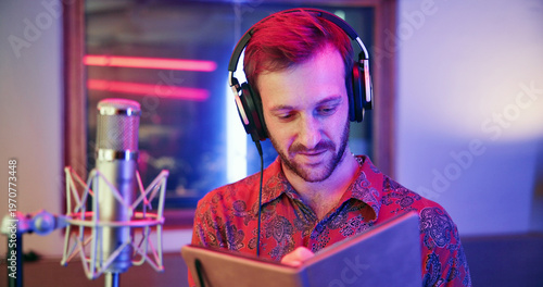 Canvas Print Writer, notebook and man in recording studio, music production or song composition with neon light