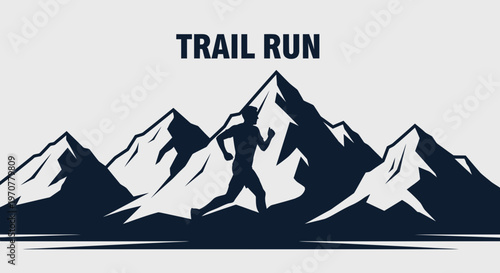 Silhouette Of A Runner Trailing Through Majestic Mountain Peaks During A Trail Run