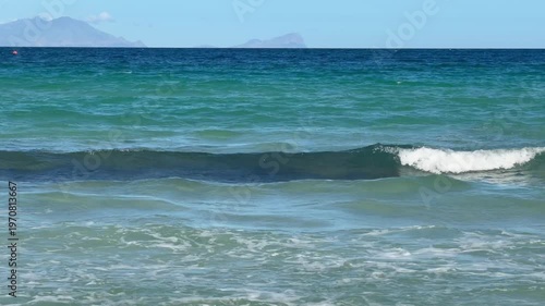 The view across False Bay from Glencairn beach near Fish Hoek, Cape Town.