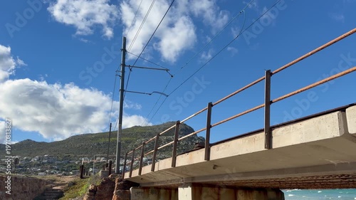 Railway bridge in Glencairn on the False Bay coastline in Cape Town, South Africa.