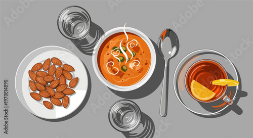Illustration of bowl of tomato soup with almonds and tea