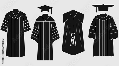 Four black graduation gowns with white accents, including caps and hoods, on a light gray background