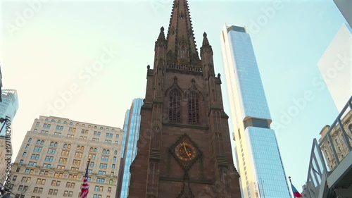 Low angle view of Trinity Church with skyscrapers New York