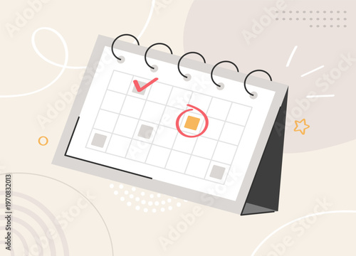 Schedule and time management concept, desk calendar with ring binding and marked dates including checkmark and circle