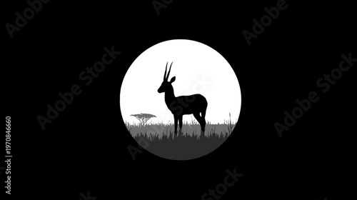 A grayscale silhouette of an antelope within a white circle against a black background