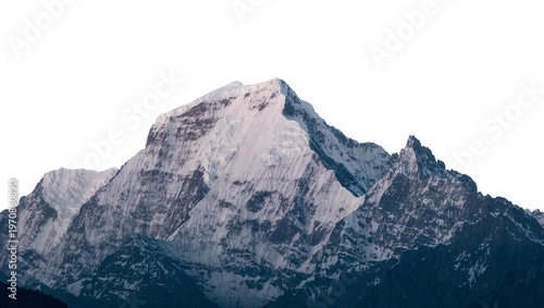 Fotografía Jagged gray mountain peak covered in snow and ice, rising above dark blue foothi