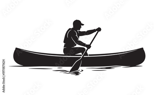 Black silhouette of a man paddling a canoe on water