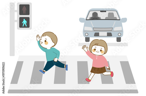 男の子と女の子が手を上げて横断歩道を渡っているイラスト