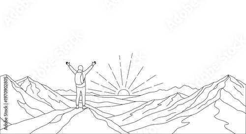 Man standing on mountain with arms raised.
