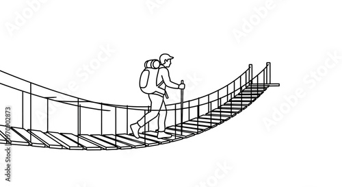 Man walking on suspension bridge alone.