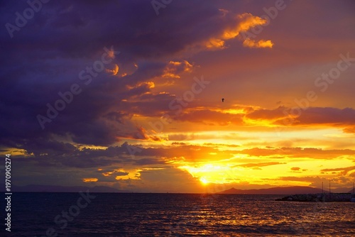 A colorful sunset from the shore of Glyfada, Greece