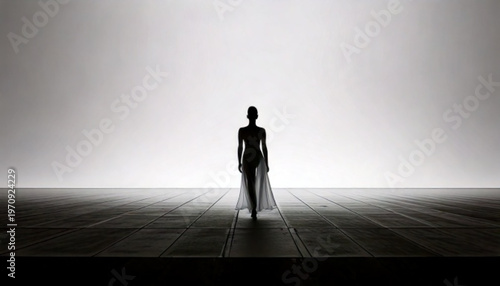 Fashion model walking on runway during a fashion show event.