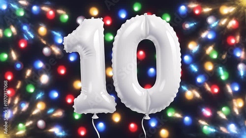 White number 10 balloon with colorful flashing disco lights. Festive video for birthday or anniversary party