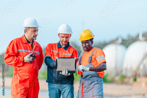 Industrial team reviewing refinery operations amid fuel supply risk and economic uncertainty