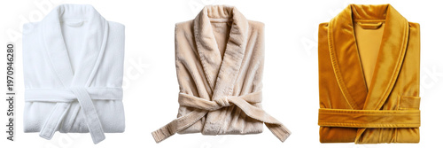 Tableau sur toile Three luxurious bathrobes in white, beige, and golden yellow, folded neatly for comfort and relaxation concepts