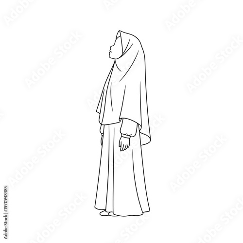 Woman wearing a hijab and abaya.