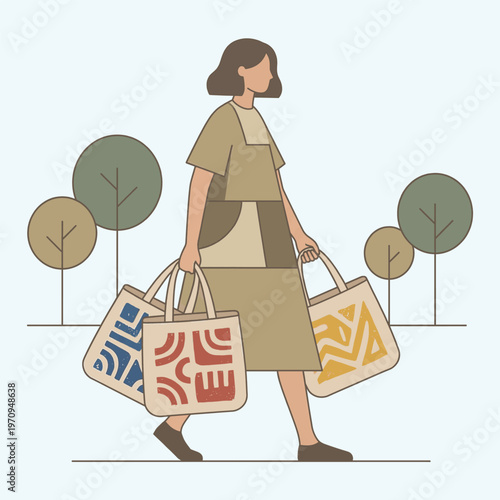Woman walking with shopping bags in a park
