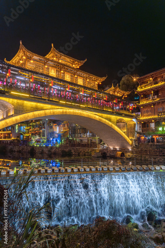 Furong Ancient Town is more than 2000 years old and home to the Tujia and Miao people, ethnic minorities in China, with lighting waterfall, The famous tourist destination at Hunan Province, China