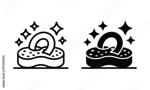 A black and white illustration of two cleaning sponges with sparkles