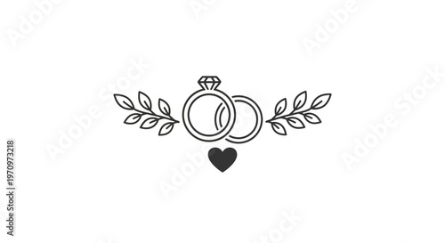 Interlocking wedding rings with heart.