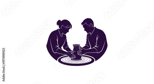 Man and woman making pottery on a wheel together
