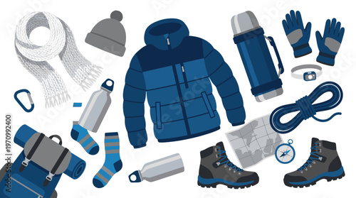 A collection of flat lay winter hiking essentials including a puffer jacket, boots, scarf, hat, gloves, backpack, and thermos on a white background.