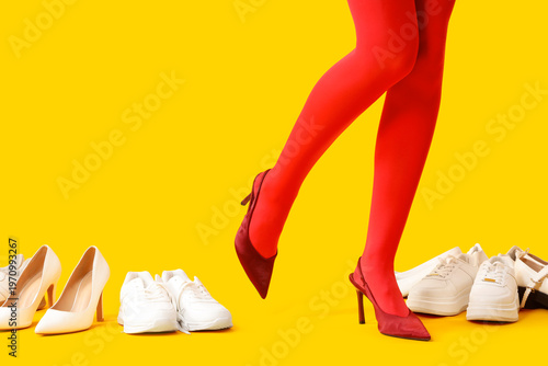 Female legs in red tights w...