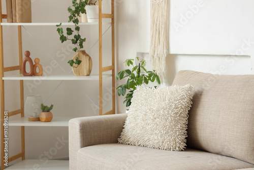 Sofa with shelving unit and...
