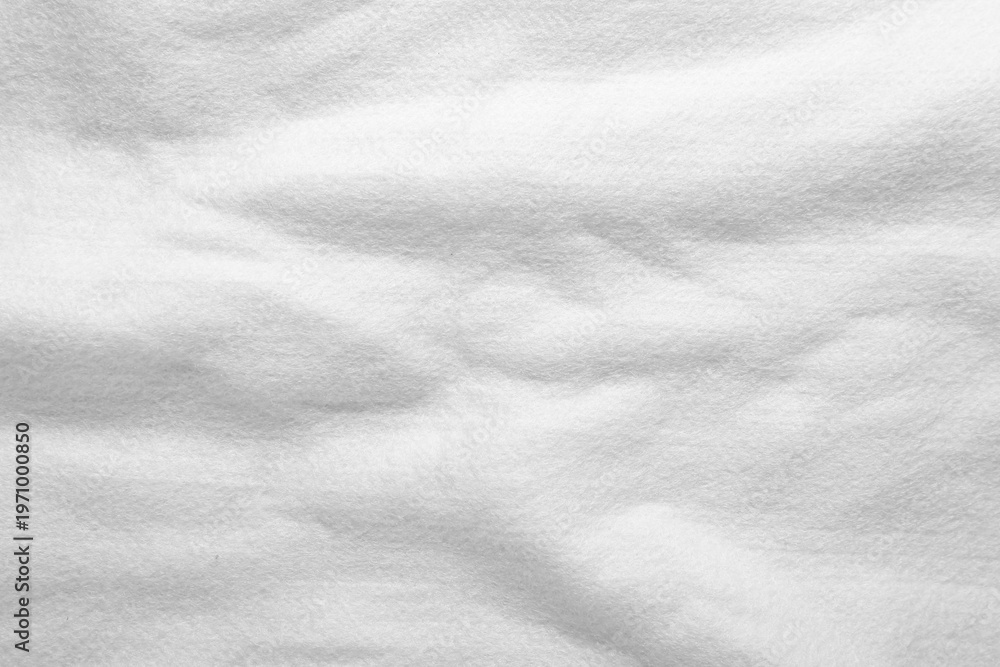 Fototapeta premium White cotton fabric as background, top view