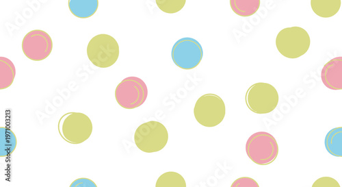 Colorful dots on white background pattern.