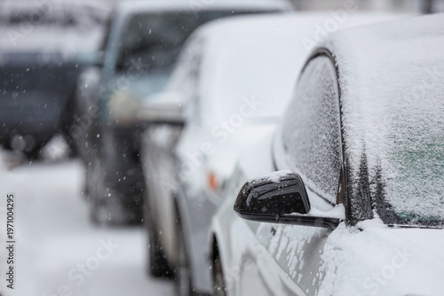 Modern car covered with sno...