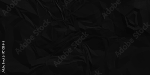 Black crumpled paper texture. Black wrinkled paper texture. Black crumpled and top view textures can be used for background of text or any contents.