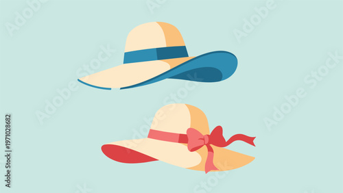 Stylish summer sun hats with wide brims are decorated with blue and red ribbons on a soft blue background for vacation themes.