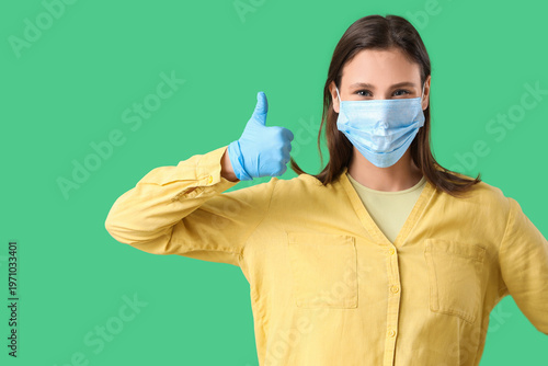 Young woman in medical mask...