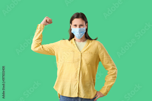 Young woman in medical mask...