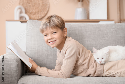 Cute little boy with cat re...