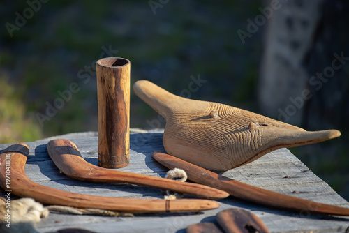 Aboriginal boomerangs and clap sticks on wooden surface traditional indigenous craft works Australia