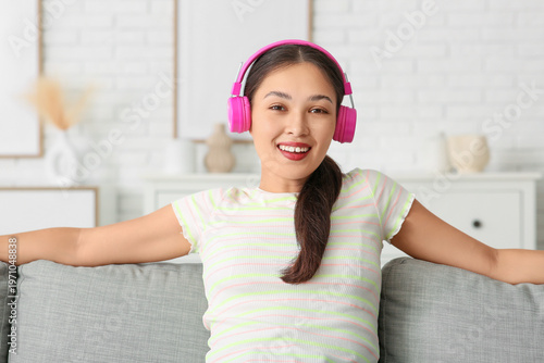 Beautiful young happy Asian...