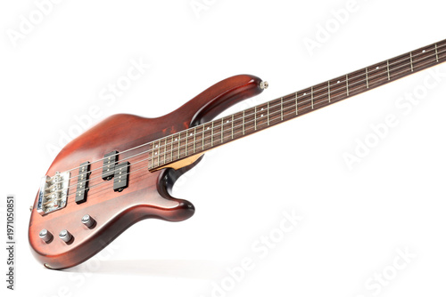 Brown electric guitar on wh...