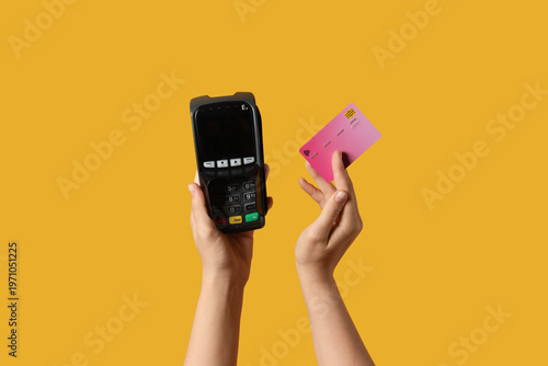 Hands with payment terminal...