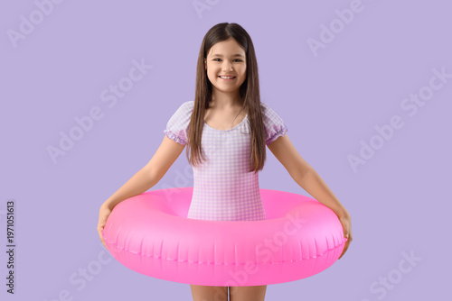 Cute girl with pink swim ri...