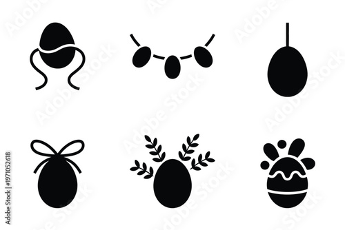 A collection of six black Easter egg icons on white