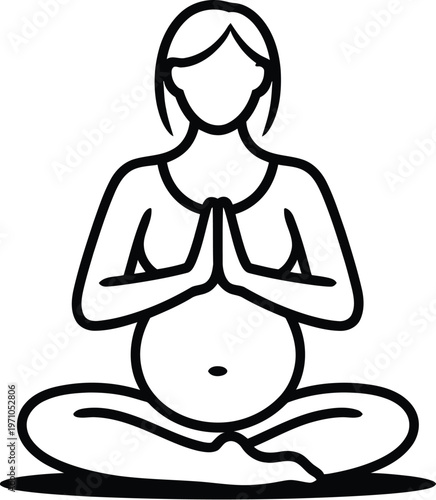 A pregnant woman practices yoga in a peaceful and serene environment