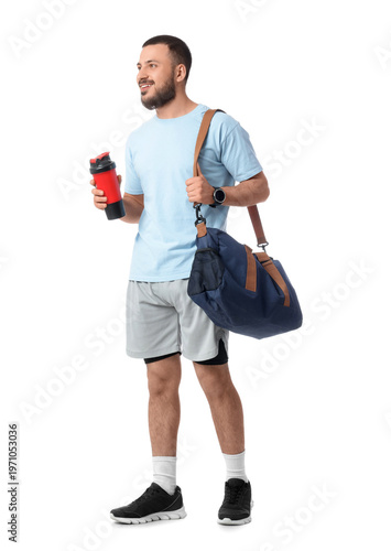 Young man with sports bag a...