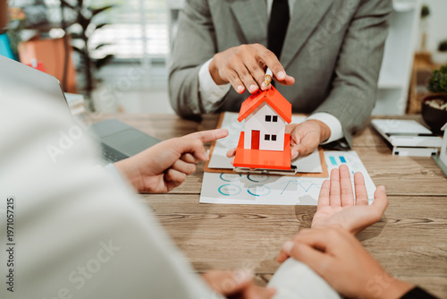 Real estate agents provide clients with a model home, along with mortgage agreements, loan agreements, lease agreements, and home purchase agreements, as well as home insurance policies.